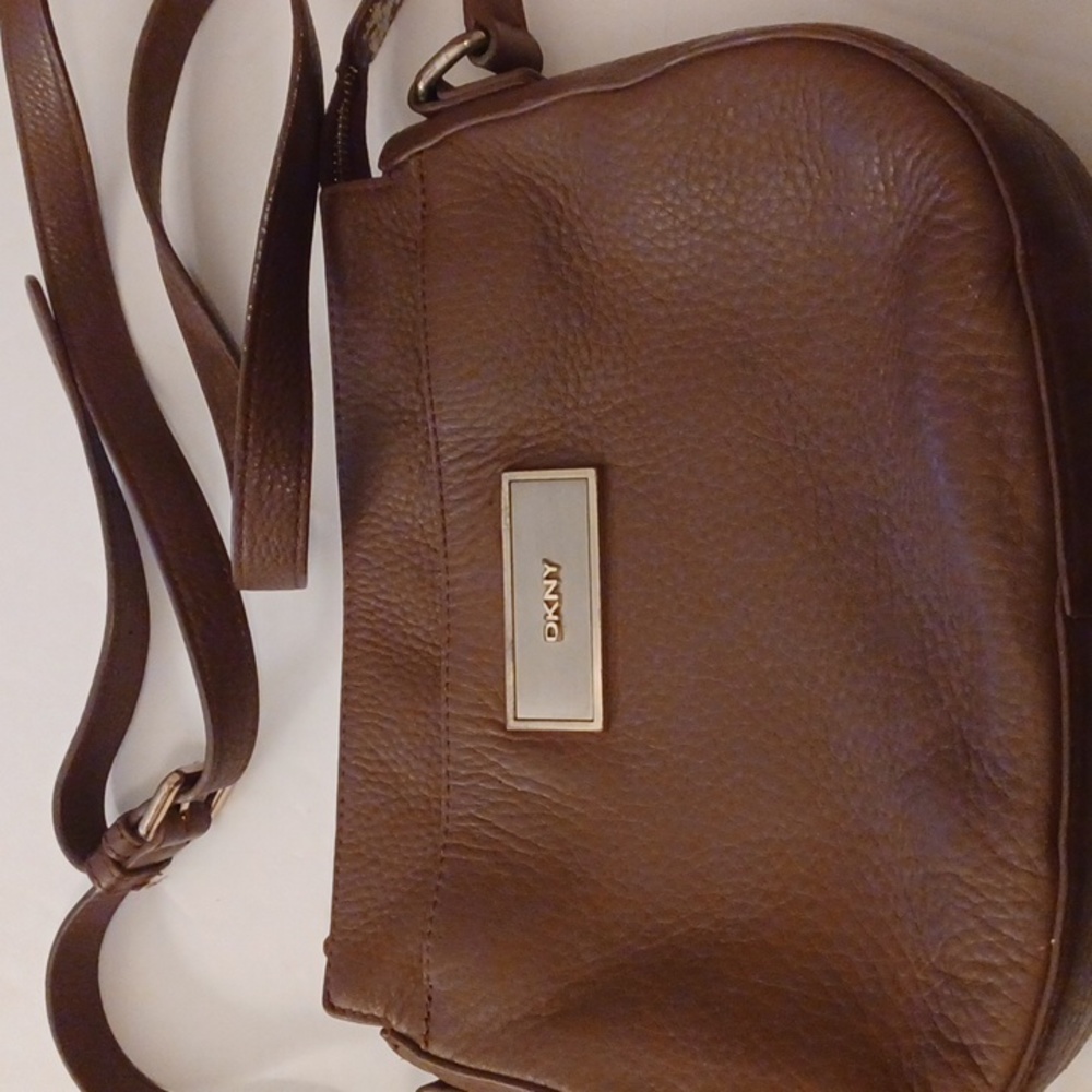 DKNY brown bag leather zip closure adjustable crossbody strap front pocket
